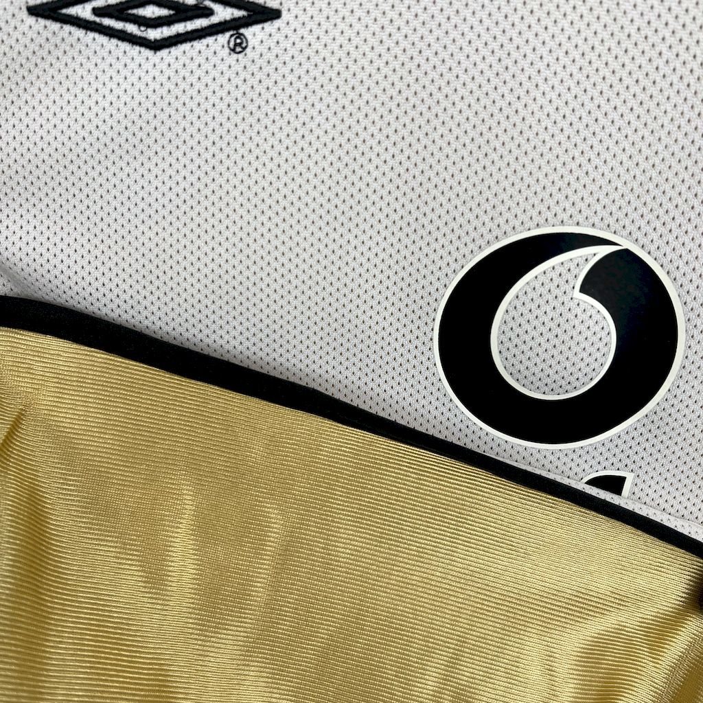 Camiseta do Manchester United Retrô 2001/02 Centenary Reversible - vista frontal