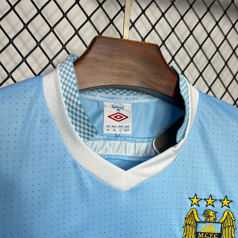 Camiseta Manchester City l Retro 2011/12 - detalle de la manga
