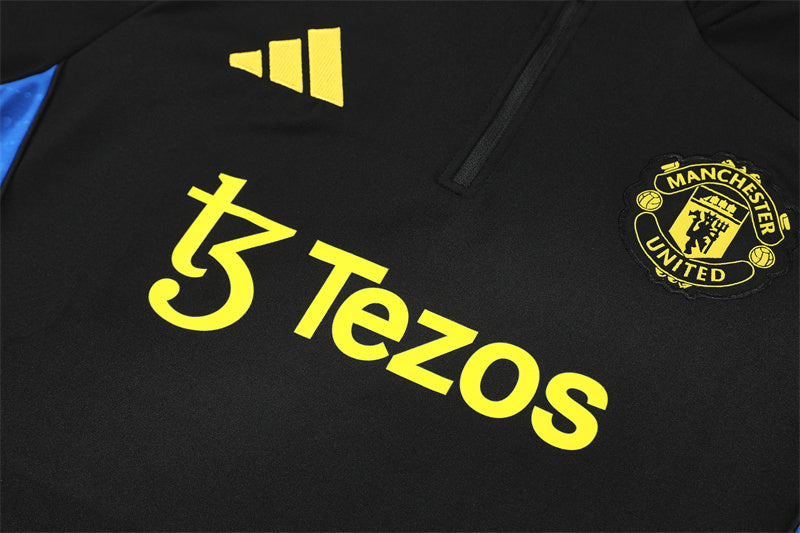 Training Suit Manchester United 25/26 - Winter - tejido y acabado