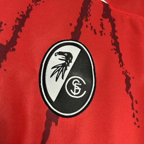 Camiseta Feminina Freiburg 24/25 Home - vista frontal